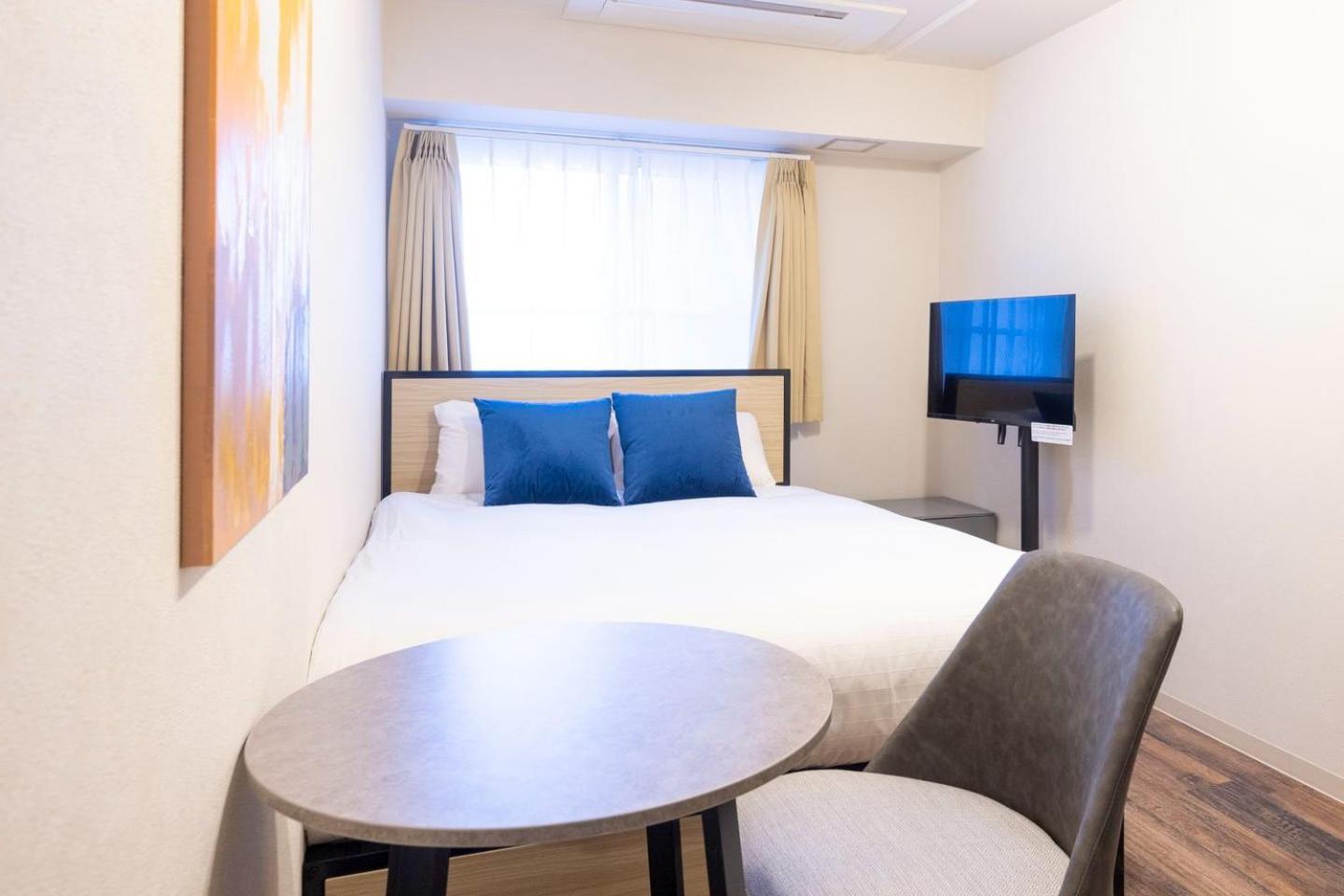 Apartamento Shinjuku Okada Building Tokio Habitación foto