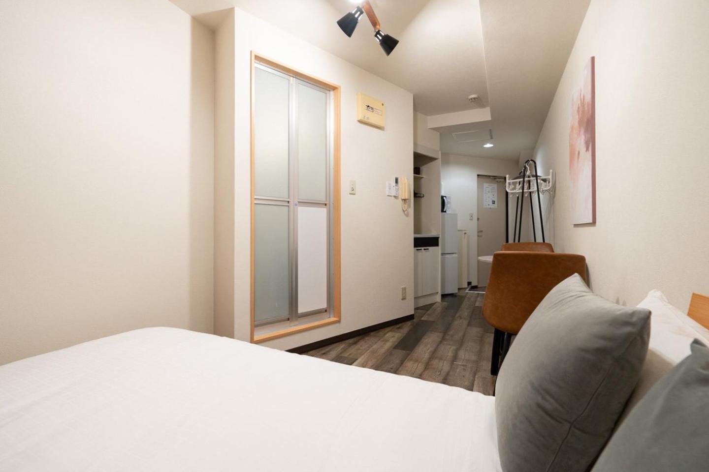 Apartamento Shinjuku Okada Building Tokio Habitación foto