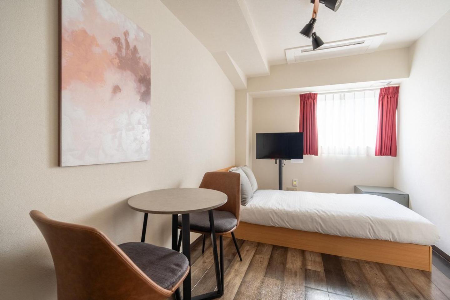 Apartamento Shinjuku Okada Building Tokio Habitación foto