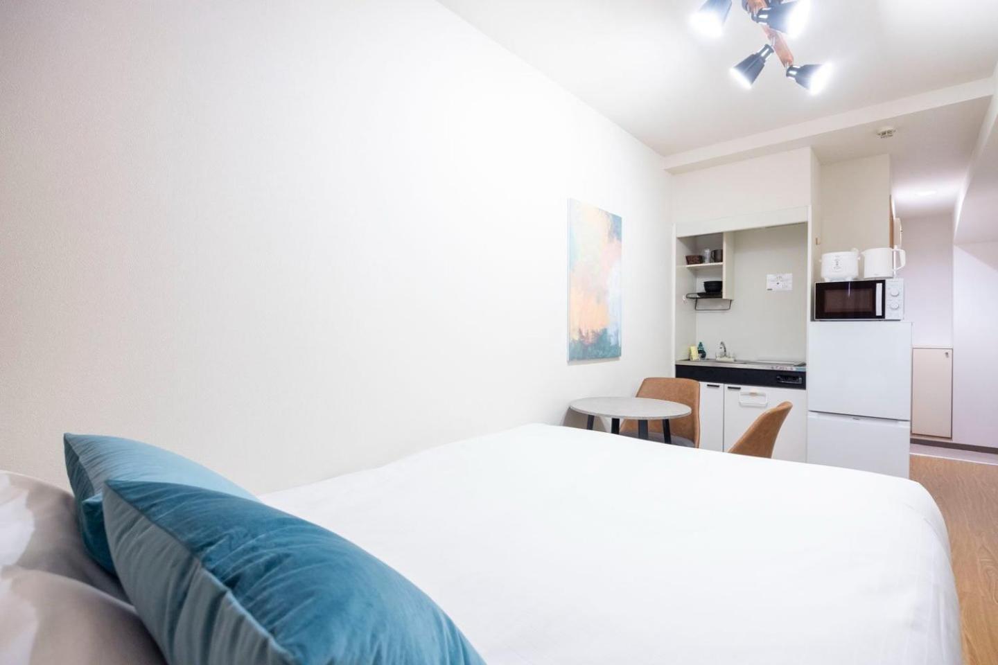 Apartamento Shinjuku Okada Building Tokio Habitación foto