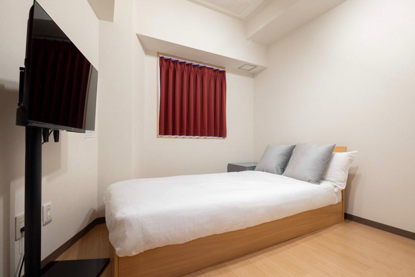 Apartamento Shinjuku Okada Building Tokio Habitación foto
