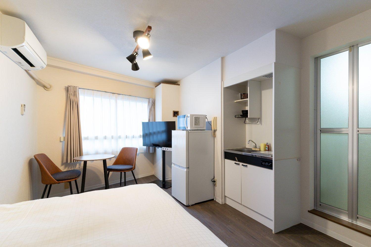 Apartamento Shinjuku Okada Building Tokio Habitación foto